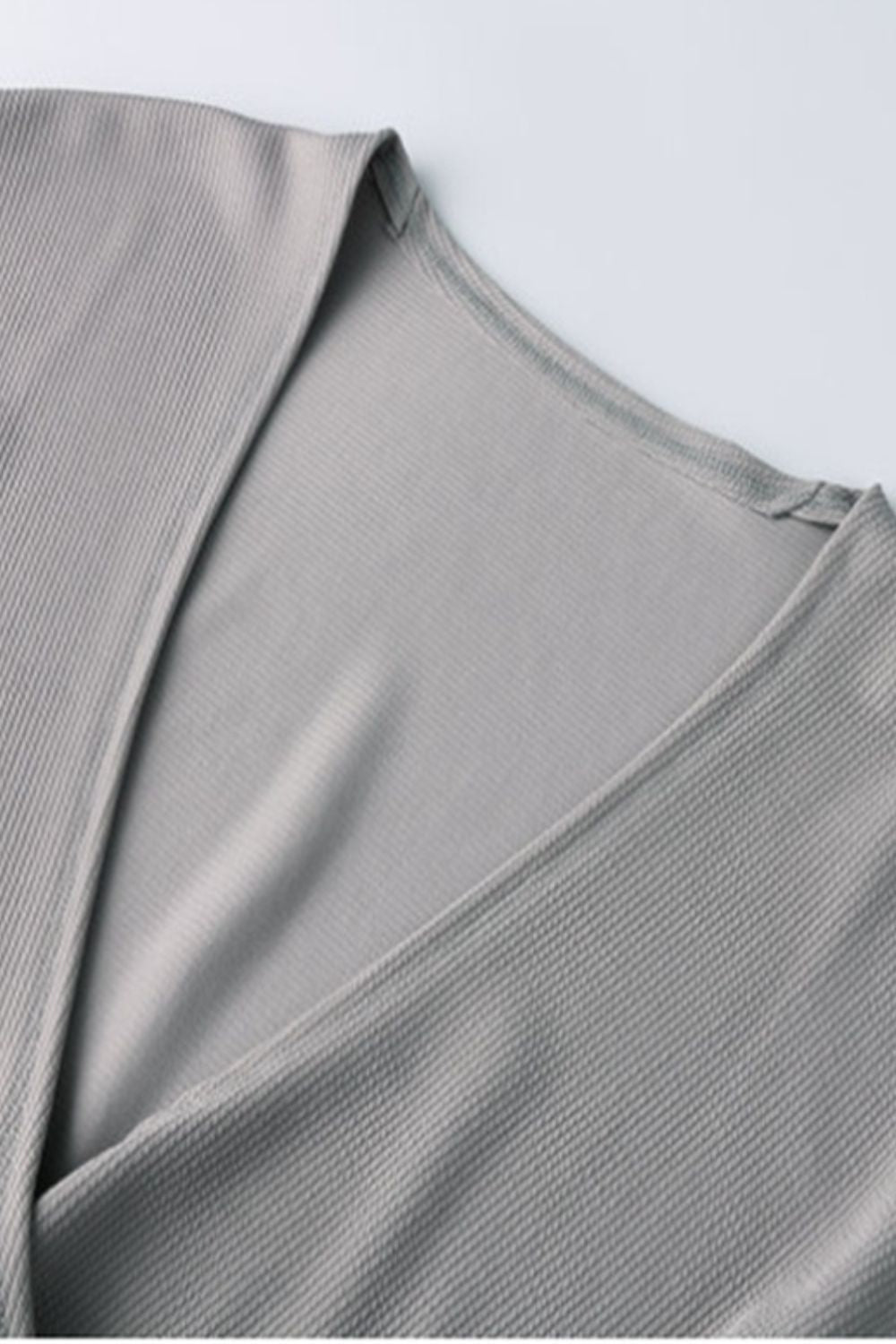 Ivy Lane Ribbed Surplice Neck Slit Top - Classique Collection