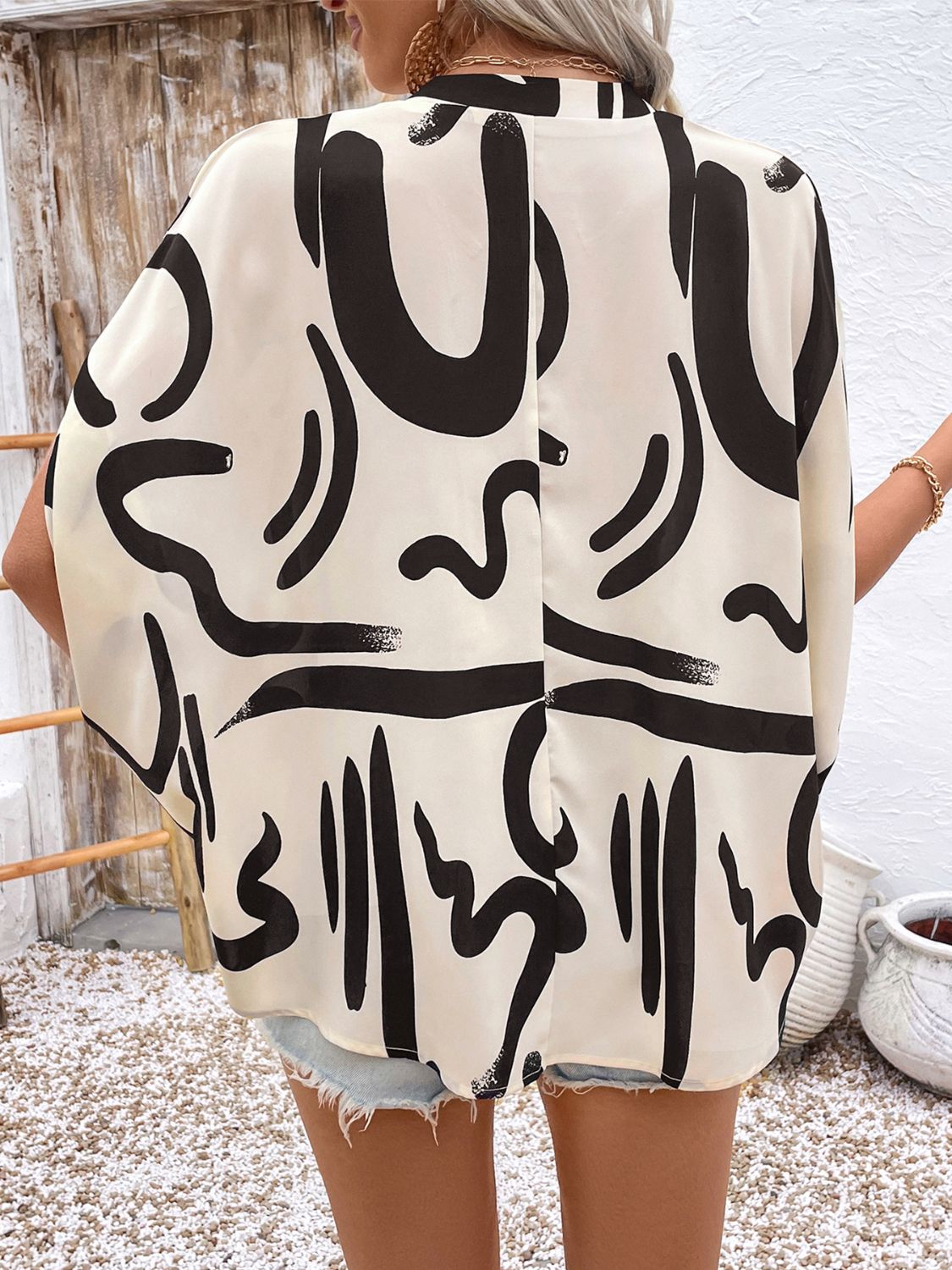 Perfee Printed Notched Half Sleeve Blouse - Classique Collection