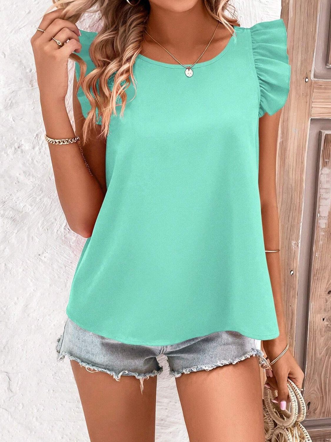 Crisscross Back Ruffled Round Neck Cap Sleeve Blouse - Classique Collection