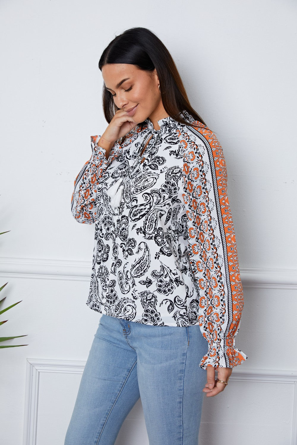 Tassel Tie Neck Printed Smocked Long Sleeve Blouse - ClassiQ