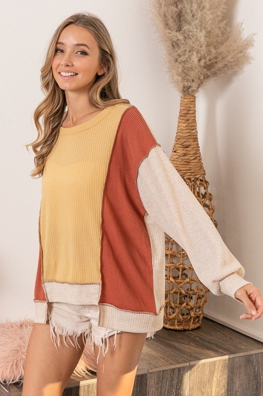 BiBi Waffle - Knit Exposed Seam Color Block Uneven Hem Top