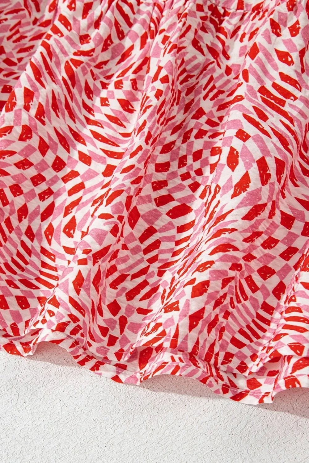 Geometric Print Knot Back Sleeveless Ruffle Hem Dress
