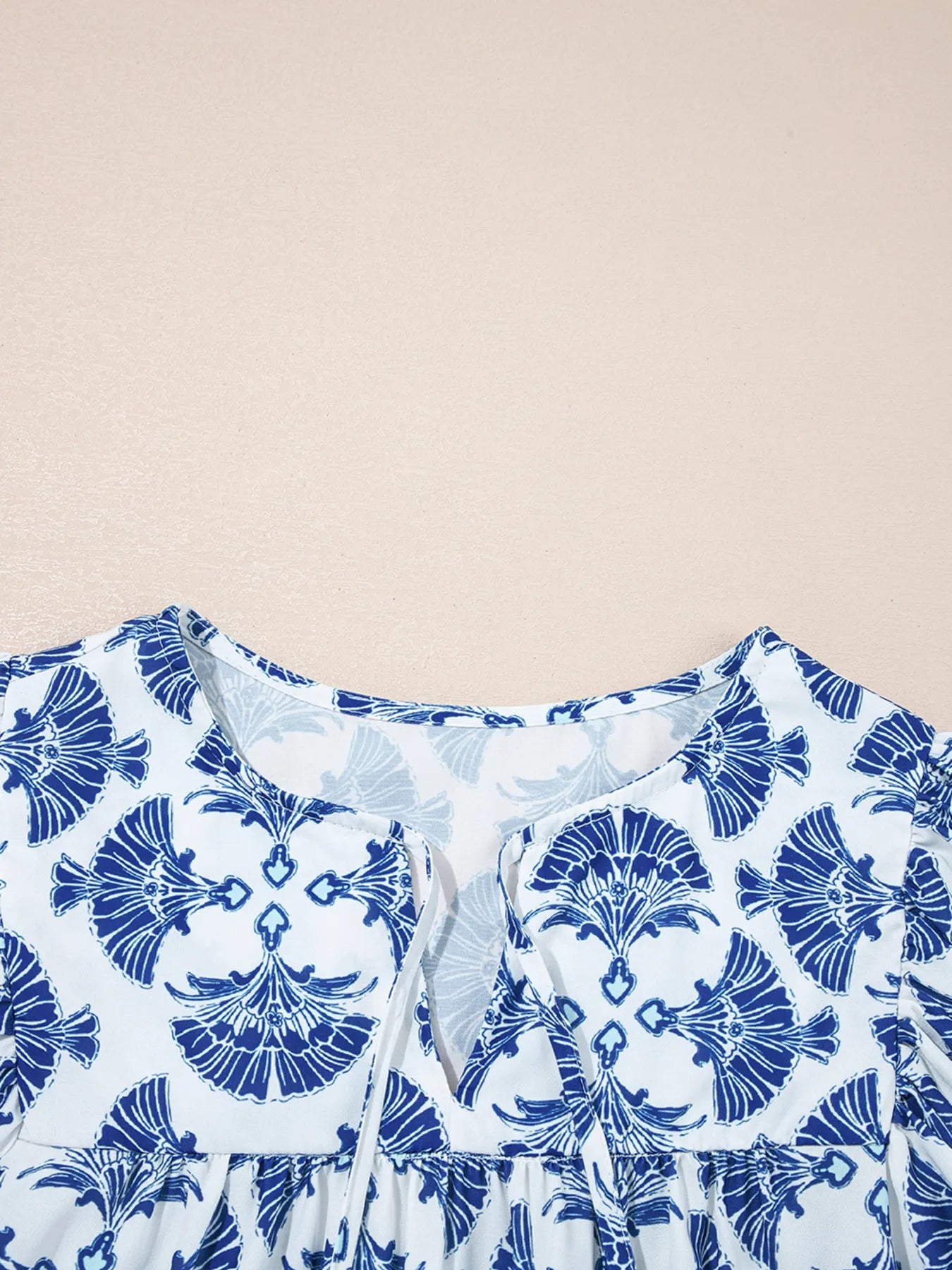 Printed Tassel Tie Neck Blouse