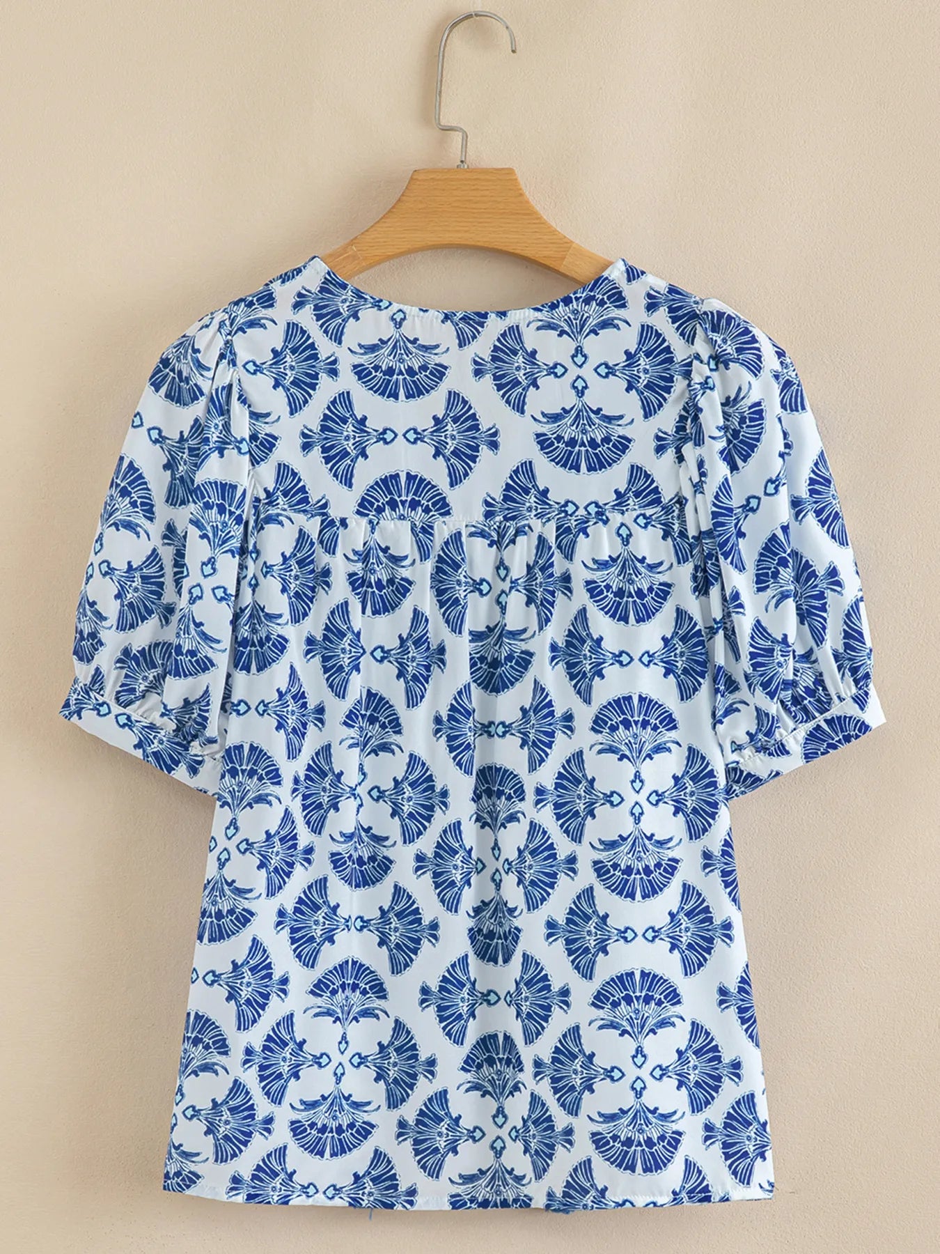 Printed Tassel Tie Neck Blouse