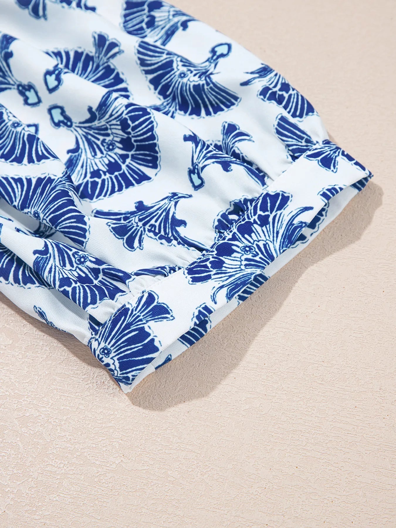 Printed Tassel Tie Neck Blouse