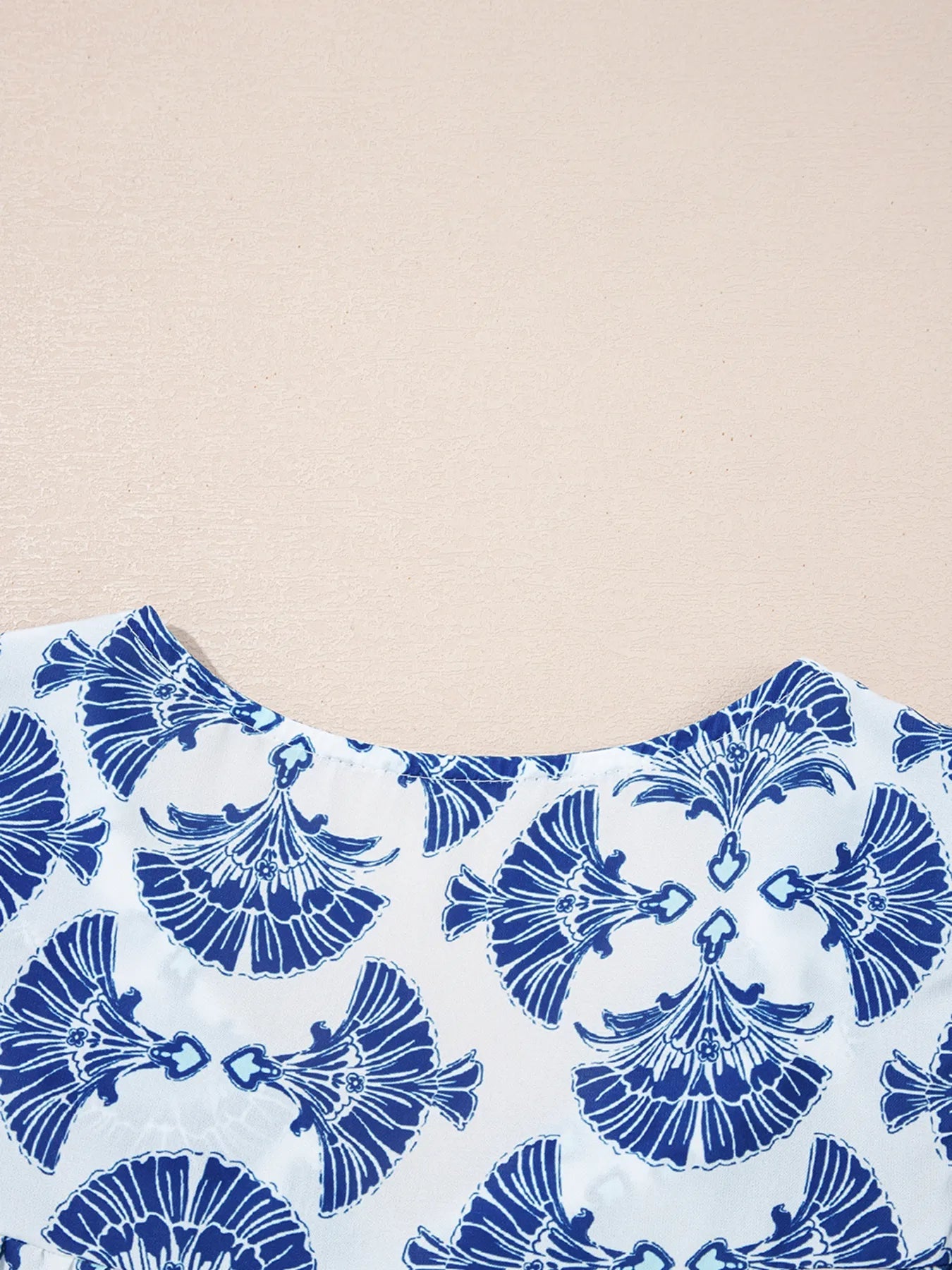 Printed Tassel Tie Neck Blouse