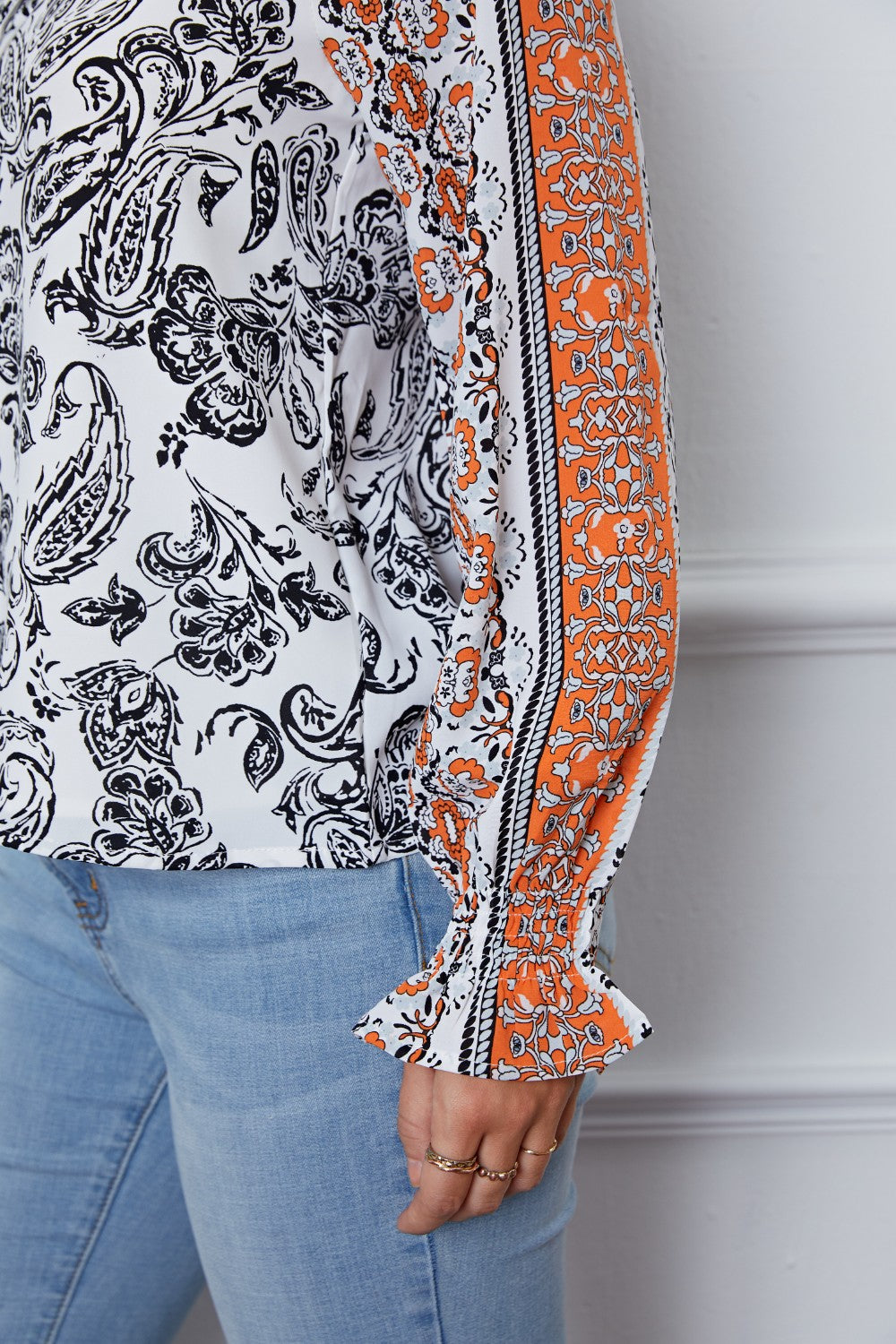 Tassel Tie Neck Printed Smocked Long Sleeve Blouse - ClassiQ