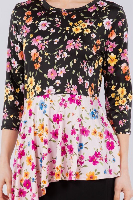 Celeste Full Size Floral Asymmetrical Hemline Round Neck Top Plus Size