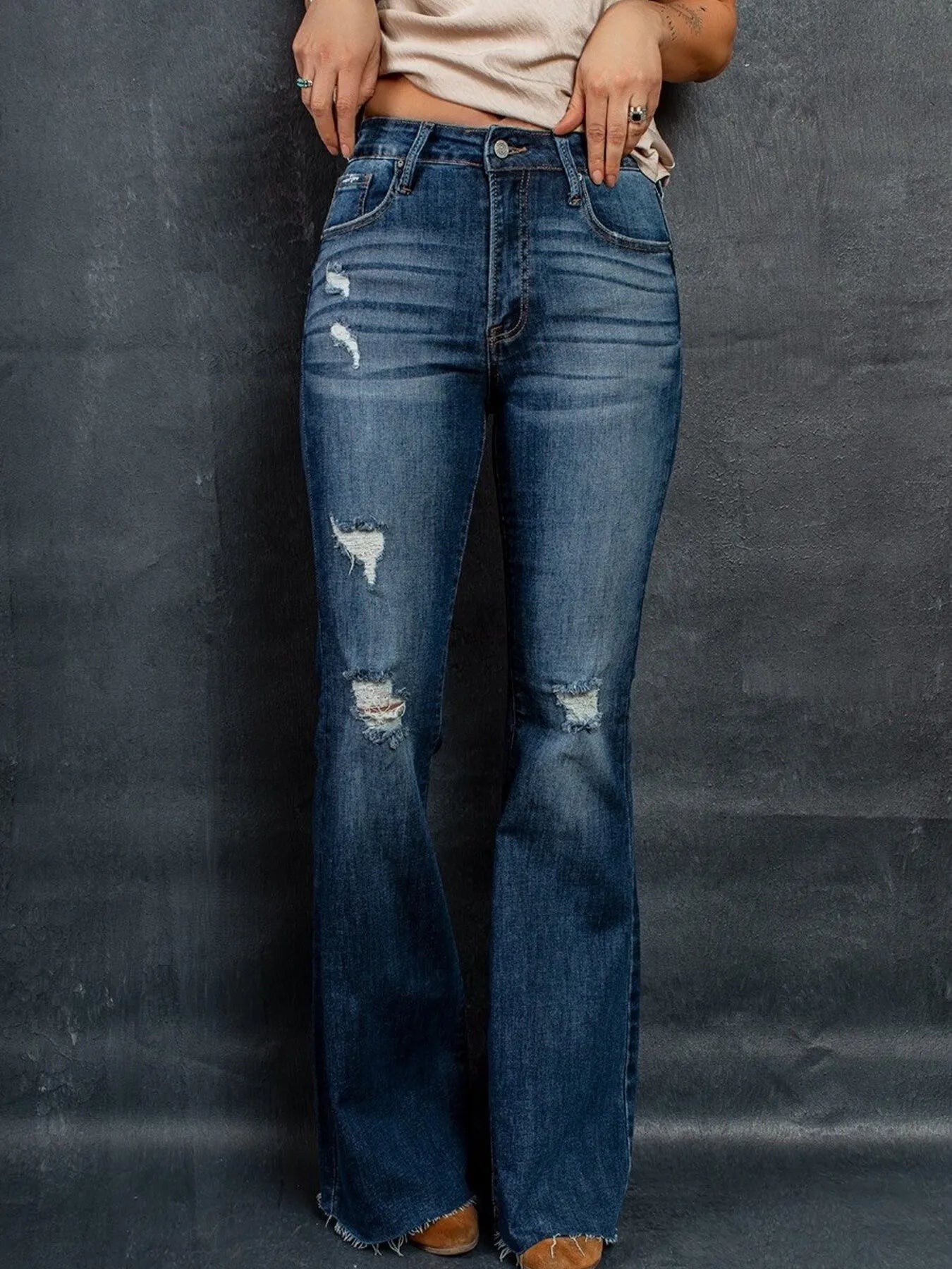 Distressed High - Waisted Flare Jeans