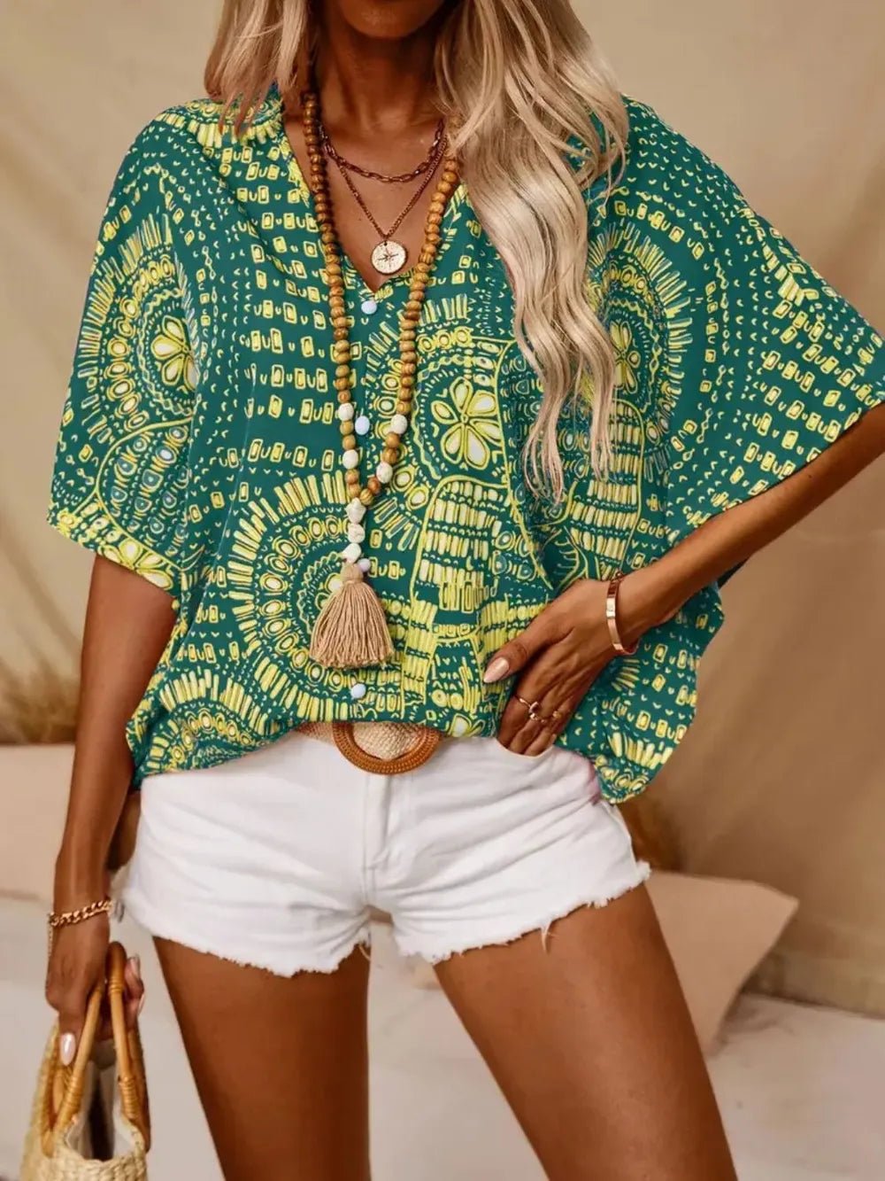 Printed V - Neck Half Sleeve Top