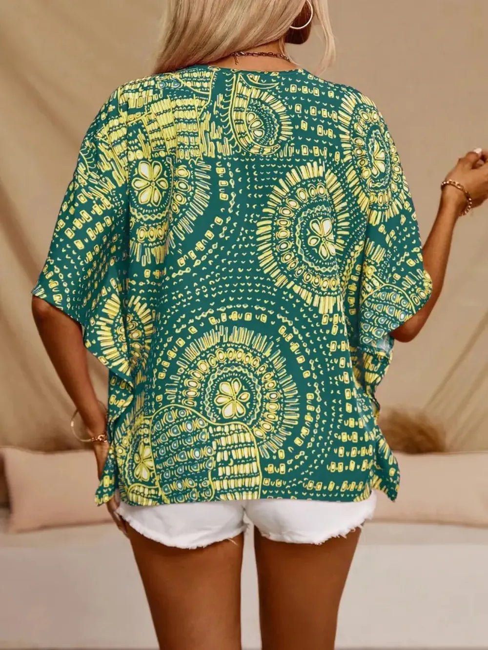 Printed V - Neck Half Sleeve Top
